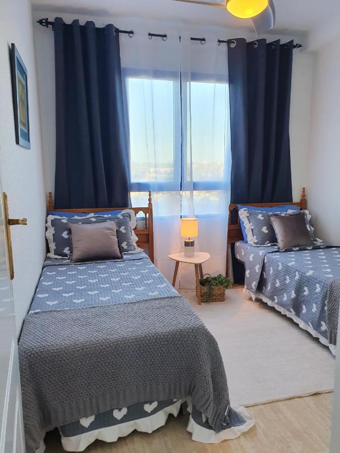 Apartment In Campoamor Overlooking The Swimming Pool Exterior photo