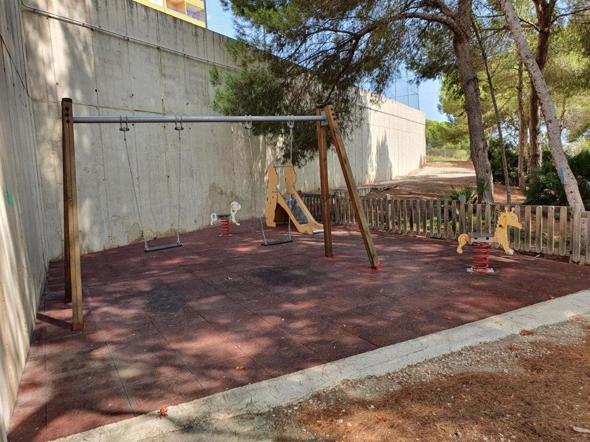 Apartment In Campoamor Overlooking The Swimming Pool Exterior photo