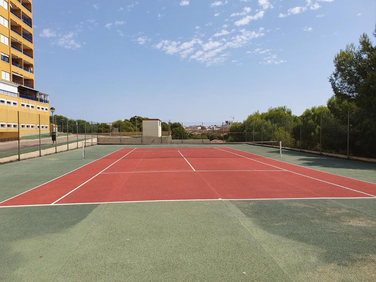 Apartment In Campoamor Overlooking The Swimming Pool Exterior photo