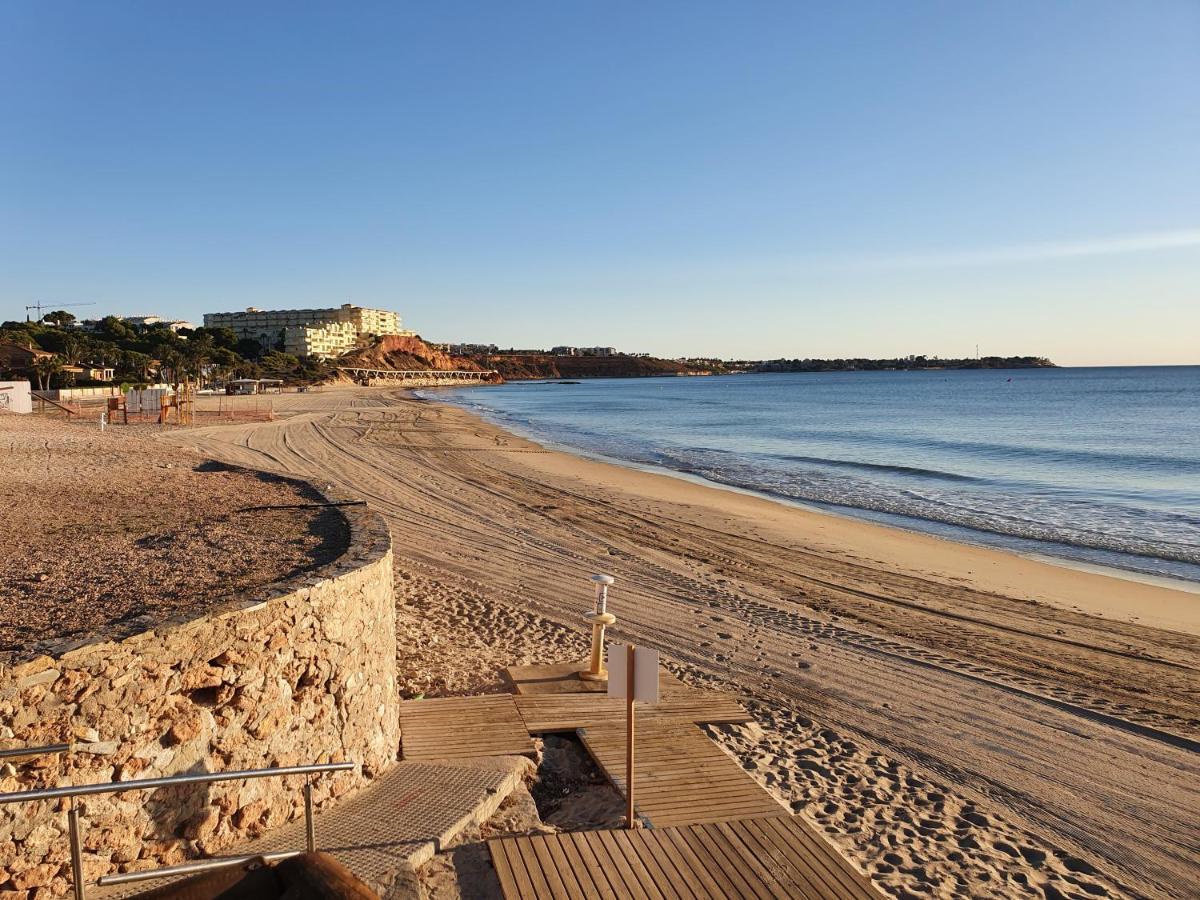 Apartment In Campoamor Overlooking The Swimming Pool Exterior photo
